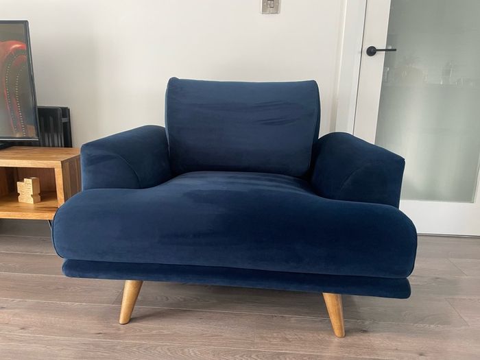 Navy velvet sofa and cuddle chair from Michael Murphy furniture