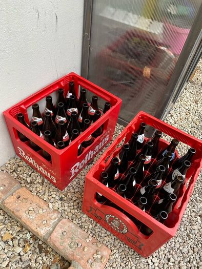 Homebrew beer bottles with crates