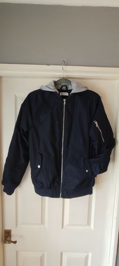 Boys navy bomber jacket with detachable hood