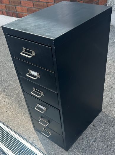 Vintage metal cabinet with drawers