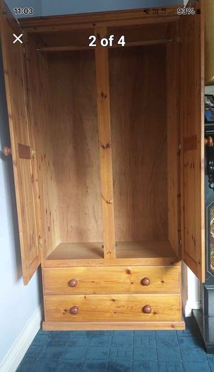 Solid wood wardrobe in excellent condition. Two Drawers.