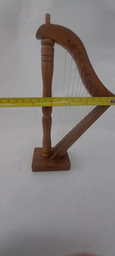 handcrafted wooden display harp ,,lovely display item for any man cave pub restaurant etc etc etc, buyer collects or pays postage.
