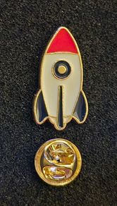 Rocket , pin back badge.