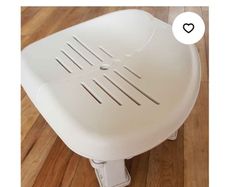 Plastic adjustable seat for hot tub or jucuzzi.