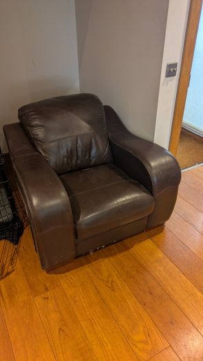 Dark brown leather armchair