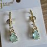 Light blue earings with small heart shapes Image 2