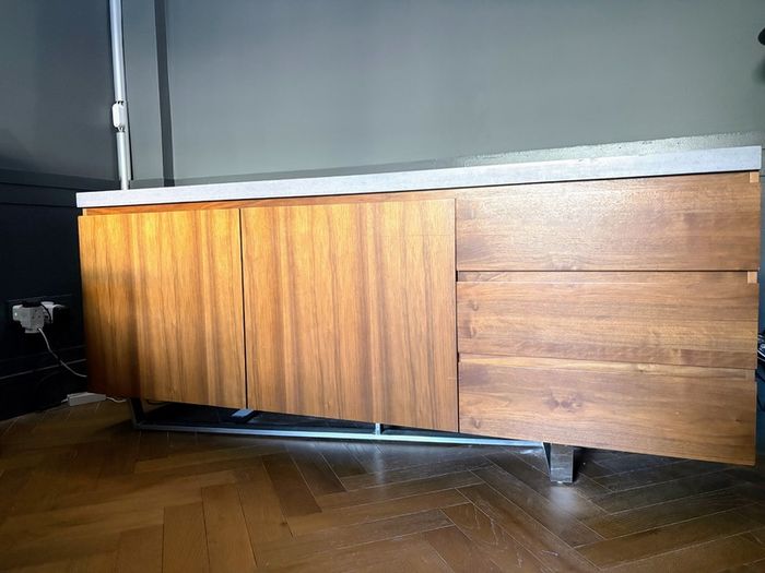 Modern walnut sideboard with stone top