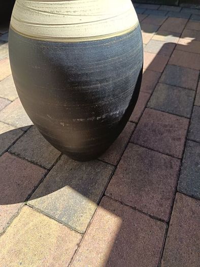 Tall floor standing vase