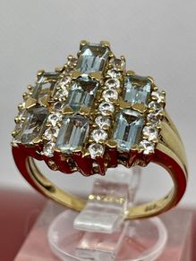 Silver ring with blue Topaz