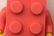 Lego light pink bricksuit mini figure