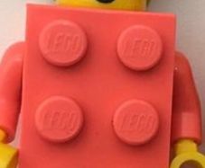 Lego light pink bricksuit mini figure