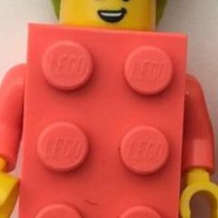 Lego light pink bricksuit mini figure