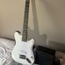 White electric guitar with amp box used only twice Image 2