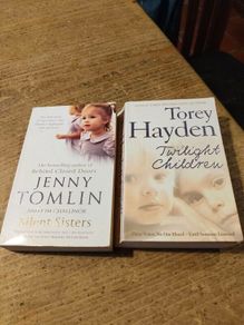 2 paperback books, true story