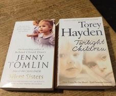 2 paperback books, true story