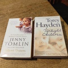 2 paperback books, true story