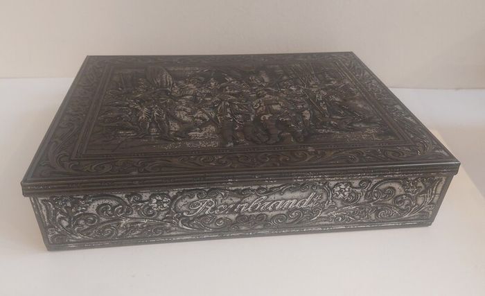Fabulous Rembrandt's The Night Watch Vintage Hinged Biscuit Tin with a Raised Relief Reproduction of the Famous Painting, Attributed to the Victoria Biscuit Company of Holland