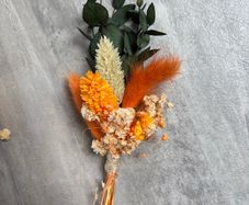 3 beautiful autumnal coloured boutonnieres
