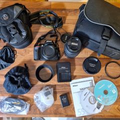 Nikon D5100 DSLR Camera + lenses+ bags