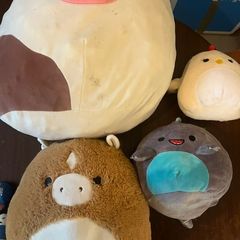 Collection of four Squishmallows plush toys, plus Micromallows