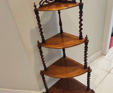 A Victorian mahogany four tier corner whatnot