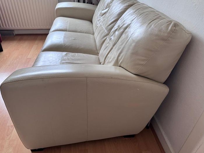 Cream leather settee