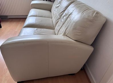 Cream leather settee