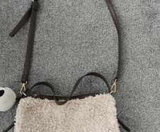 Sheepskin clutch bag