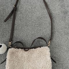 Sheepskin clutch bag