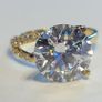 14k Gold ring with 5.2 ct Lab-Grown Diamonds, 5.04 ct main diamond cerified by IGI and Laser inscripted Ideal cut VVS2! Image 2