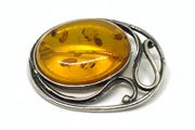 Art Nouveau silver brooch with Amber