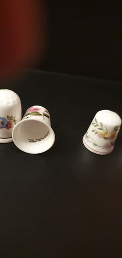 Collection of Flower Themed Gold Coloured Edged Thimbles