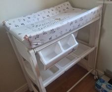 changing table with bathub