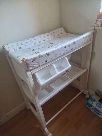 changing table with bathub