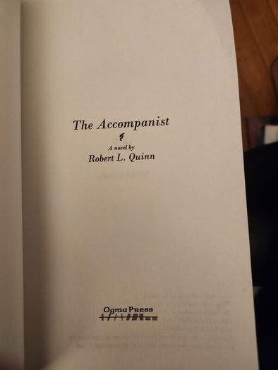 The Accompanist By Robert L. Quinn. First Edition Paperback In Good Condition.