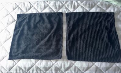2 black cushion covers