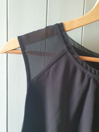 Black sleeveless top