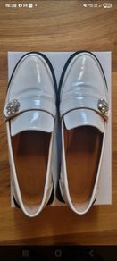 ladies GANNI white leather loafers with diamante buckle
