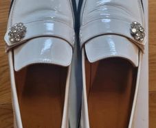 ladies GANNI white leather loafers with diamante buckle