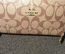 Coach brown/tan logo purse