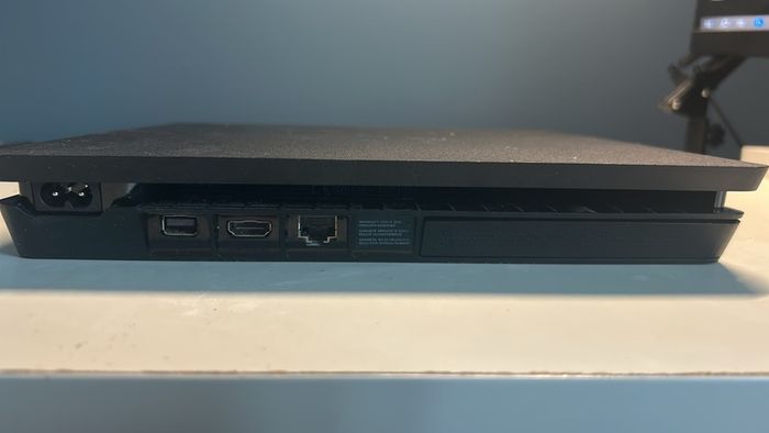 PlayStation 4 with 2 controllers, preloaded games and original box