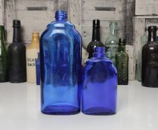 392 - Set of Two Beautiful Vintage Cobalt Blue Glass Decorative Collectible Optrex Bottles