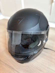 Dainese motorcycle black matte helmet with integrated Bluetooth