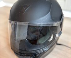 Dainese motorcycle black matte helmet with integrated Bluetooth
