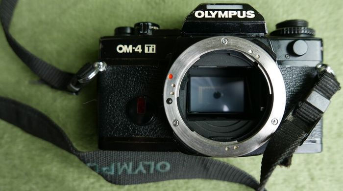 Olympus OM-4Ti Black 35mm SLR Film Camera Titan Body JAPAN and Vivitar series 1 28-90mm F2.8-3.5  FD mount lens