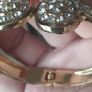 Beautiful gold-tone suit bracelet with crystals. Image 7