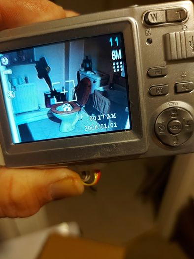 Z880 Digital Camera, Takes 2AA Batteries, working fine, has a modification that doesn't affect its performance