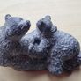 The figurine is a bears sculpture, manufactured by Wolf Originals in Canada. Image 7