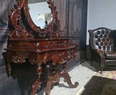 Rococo revival mahogany console table with ornate mirror