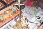 Very Old Solid Brass Man and Dog under a Street Lamp